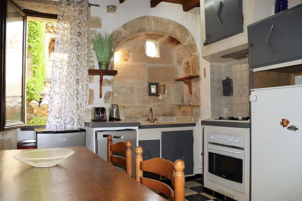 Appartamento Entre Uzes Et Le Pont-Du-Gard Le Logis D'Autrefois Castillon-du-Gard Esterno foto